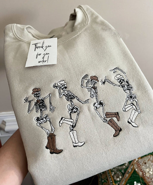 🎃🔥（Best seller）Cowboy Skeletons Sweatshirt Embroidered, Dainty Dancing Skeletons Sweatshirt, Spooky Season