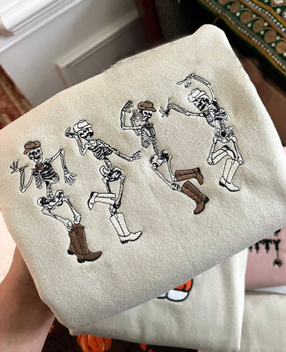 🎃🔥（Best seller）Cowboy Skeletons Sweatshirt Embroidered, Dainty Dancing Skeletons Sweatshirt, Spooky Season